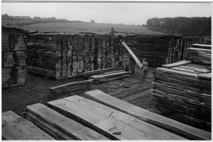 Stacking wood, Penn Street, 1944